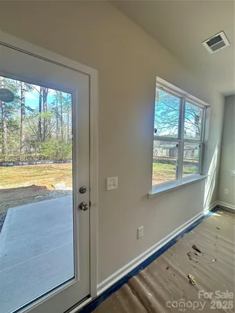 a view of a room and window