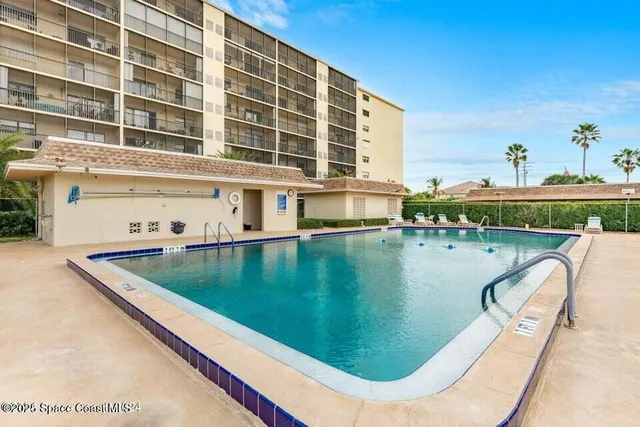 a view of an outdoor space and tennis court