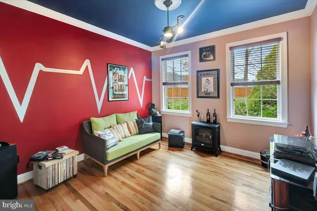 a bathroom with a sink a mirror and a shower