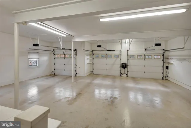 a kitchen with stainless steel appliances a stove microwave and sink