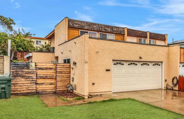a view of a back yard of the house