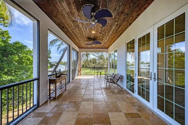 a view of a porch with furniture
