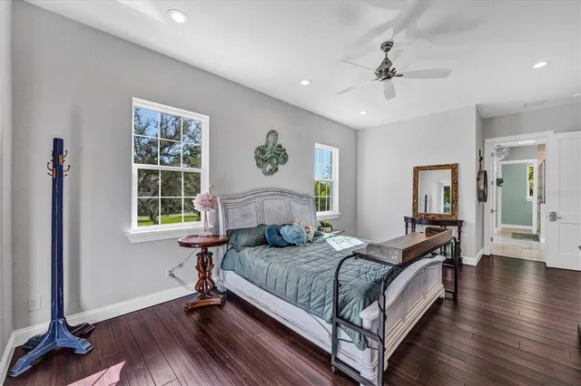 a spacious bathroom with a double vanity sink mirror and double