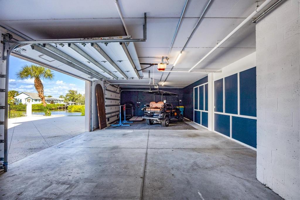 10050 Creekside Drive Placida, FL 33946 - Photo 38 of 52 a view of a bike garage
