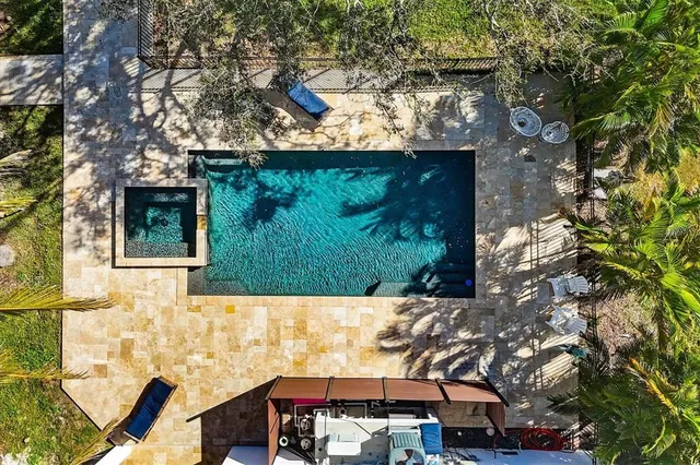 a view of a lake with a house in the background