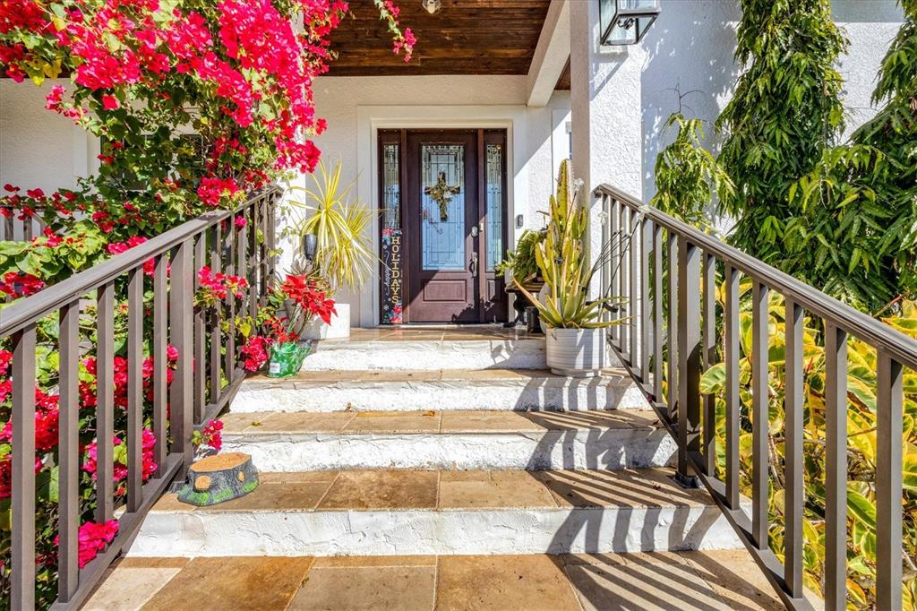 10050 Creekside Drive Placida, FL 33946 - Photo 6 of 52 a view of building with an outdoor space