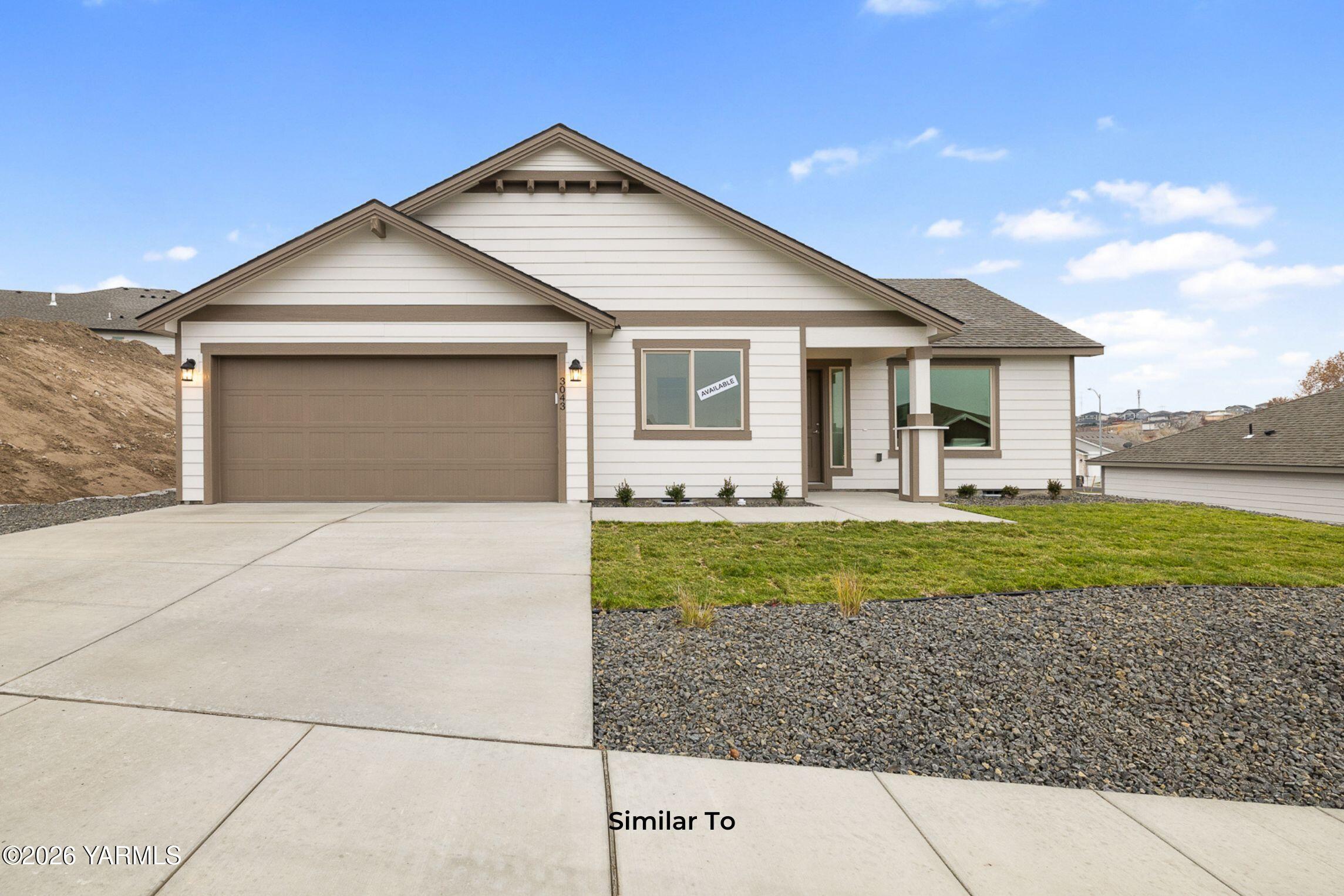 517 Grapevine Street, Unit PHASE 3 LOT 20) SPEC Grandview, WA 98930 - Photo 1 of 17 1150 - Primary Photo