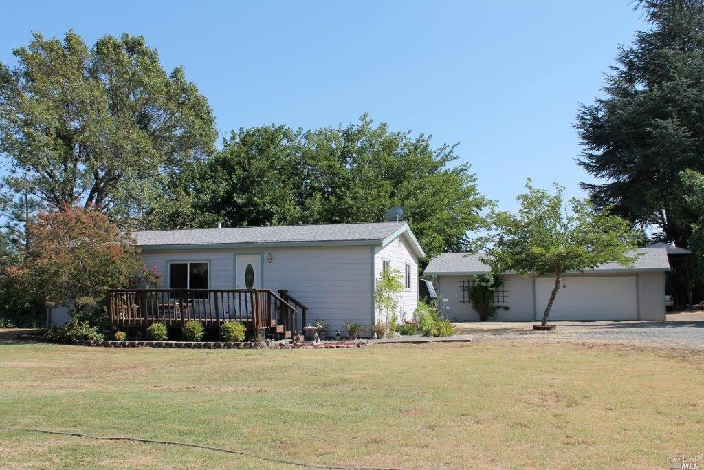 751 Rd North Redwood Valley, CA 95470 - Photo 1 of 1 a view of a house with backyard and a tree