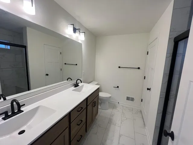 $644,900 | N66W25688 Big Sky Drive, Sussex, WI 53089