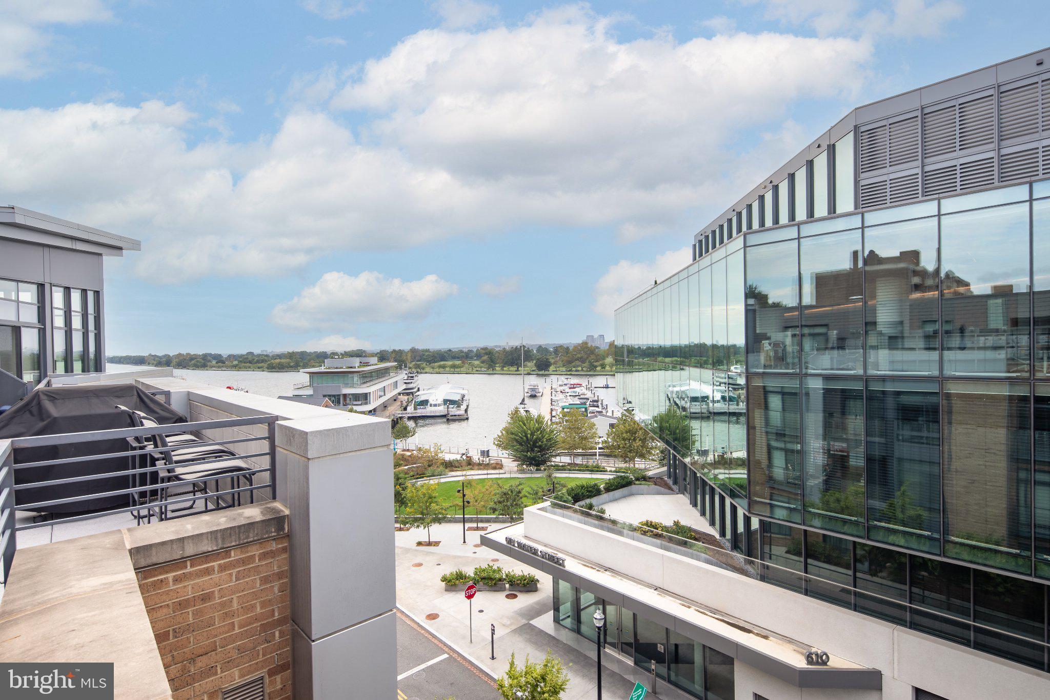 Scenic waterfront view with modern architecture.