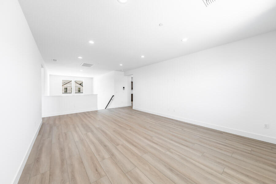 401 Pah Rah Rdg Drive, Unit MAGNOLIA 35 Sparks, NV 89441 - Photo 14 of 21 a view of empty room with wooden floor