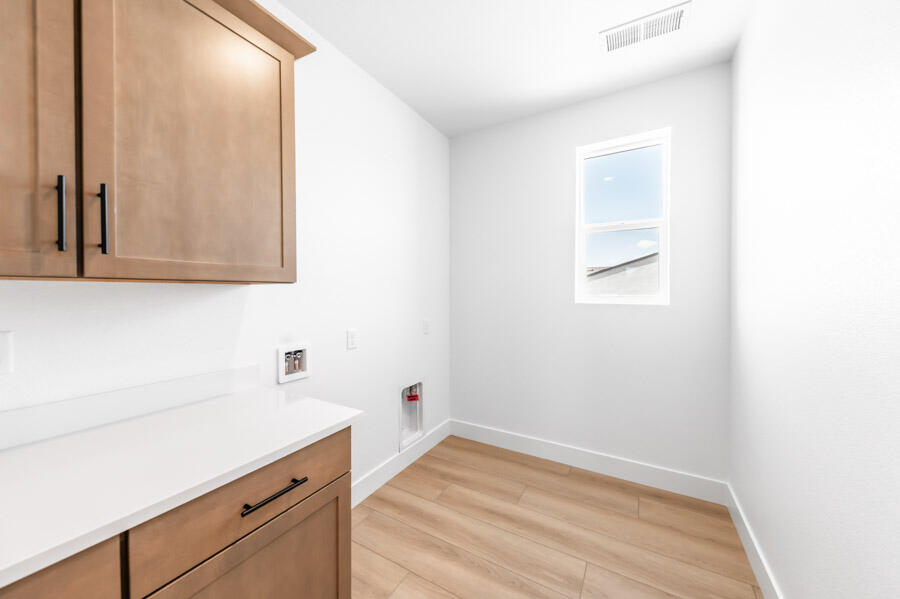 401 Pah Rah Rdg Drive, Unit MAGNOLIA 35 Sparks, NV 89441 - Photo 19 of 21 a room with a sink and cabinets