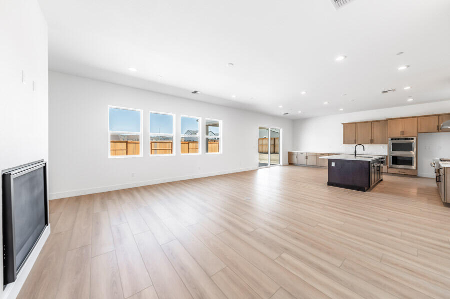 401 Pah Rah Rdg Drive, Unit MAGNOLIA 35 Sparks, NV 89441 - Photo 5 of 21 a view of kitchen and kitchen with furniture wooden floor and window