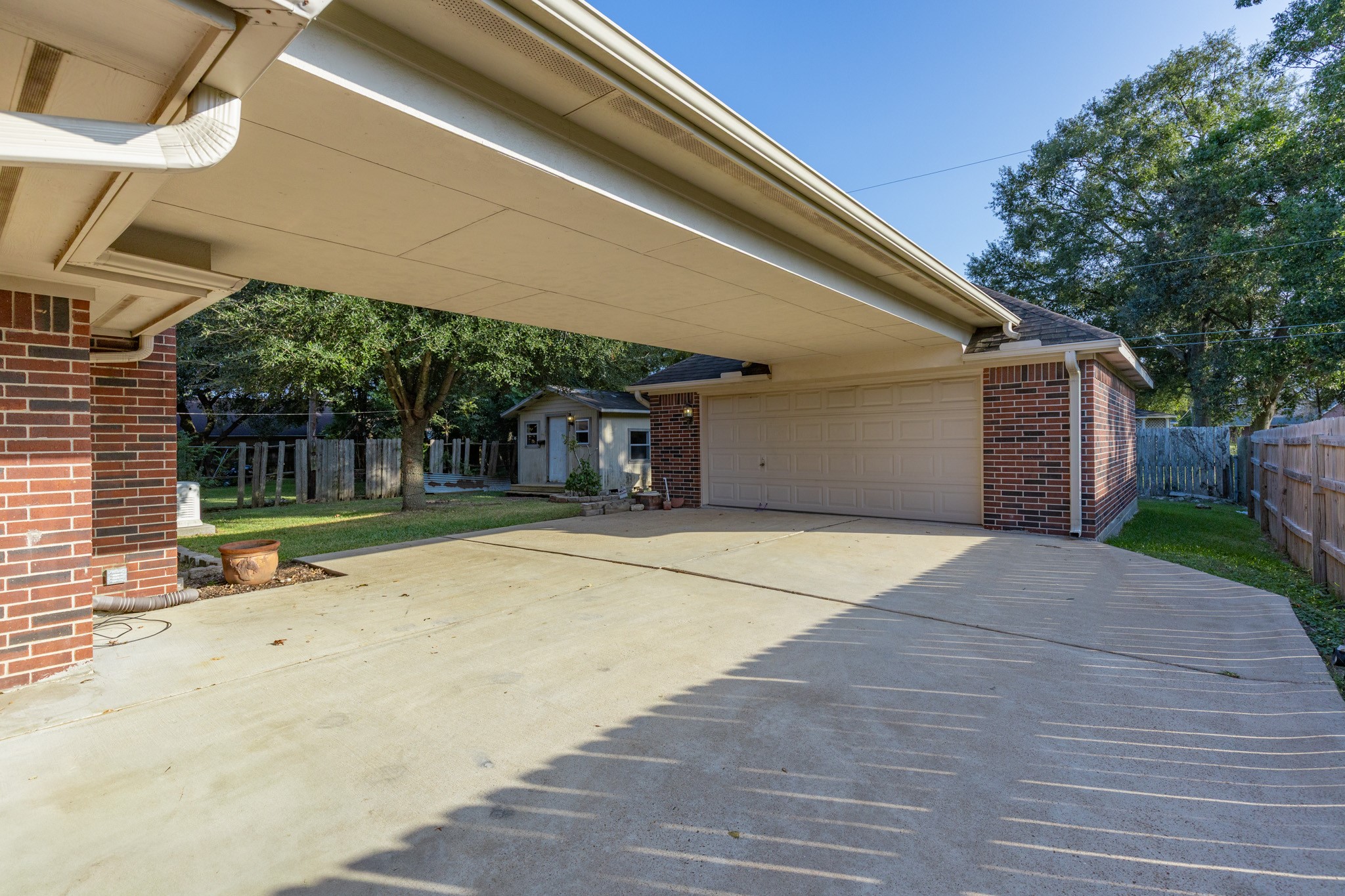 8018 Holiday Lane Houston, TX 77075 - Photo 35 of 42 a house with trees in front of it
