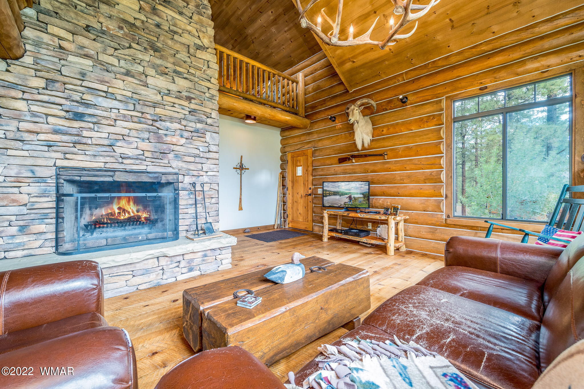 11 N1063 Greer, AZ 85927 - Photo 12 of 31 a outdoor living space with furniture and a fireplace