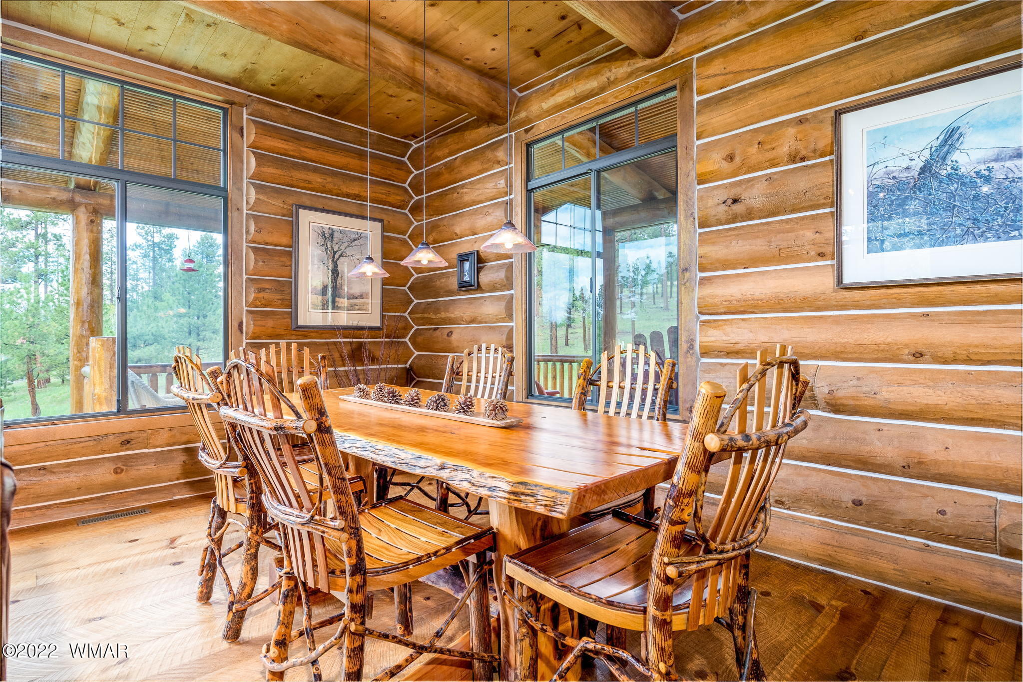 11 N1063 Greer, AZ 85927 - Photo 13 of 31 a dining room with furniture and floor to ceiling windows
