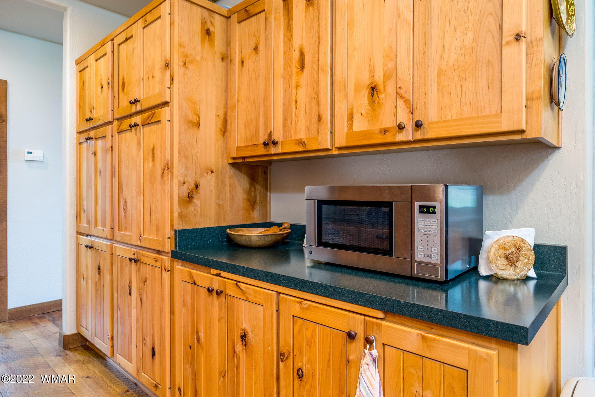11 N1063 Greer, AZ 85927 - Photo 17 of 31 a kitchen with a sink and a microwave