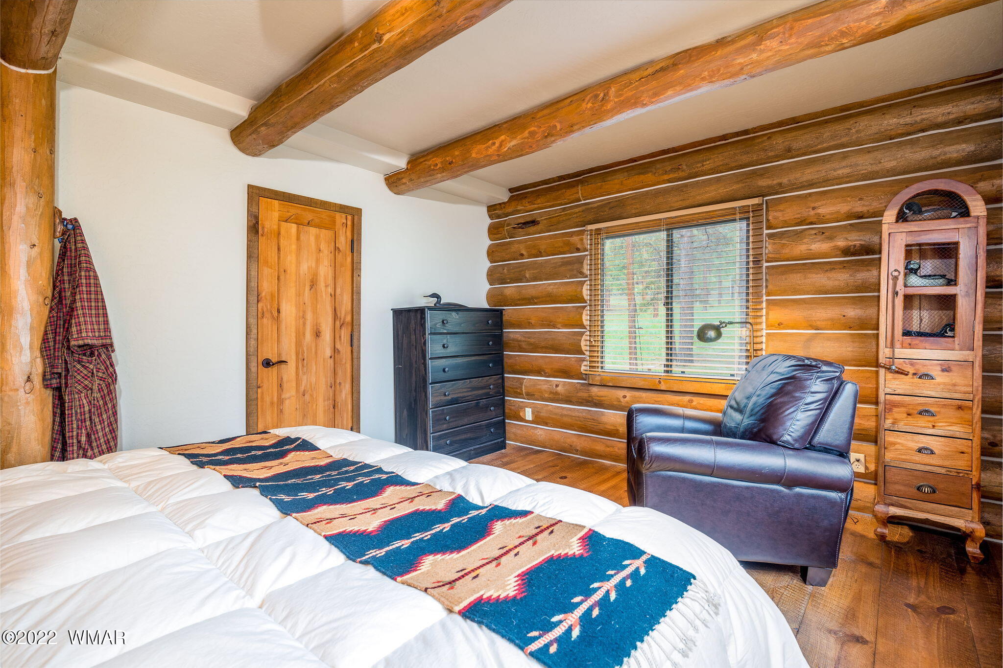 11 N1063 Greer, AZ 85927 - Photo 19 of 31 a bedroom with a bed and wooden floor