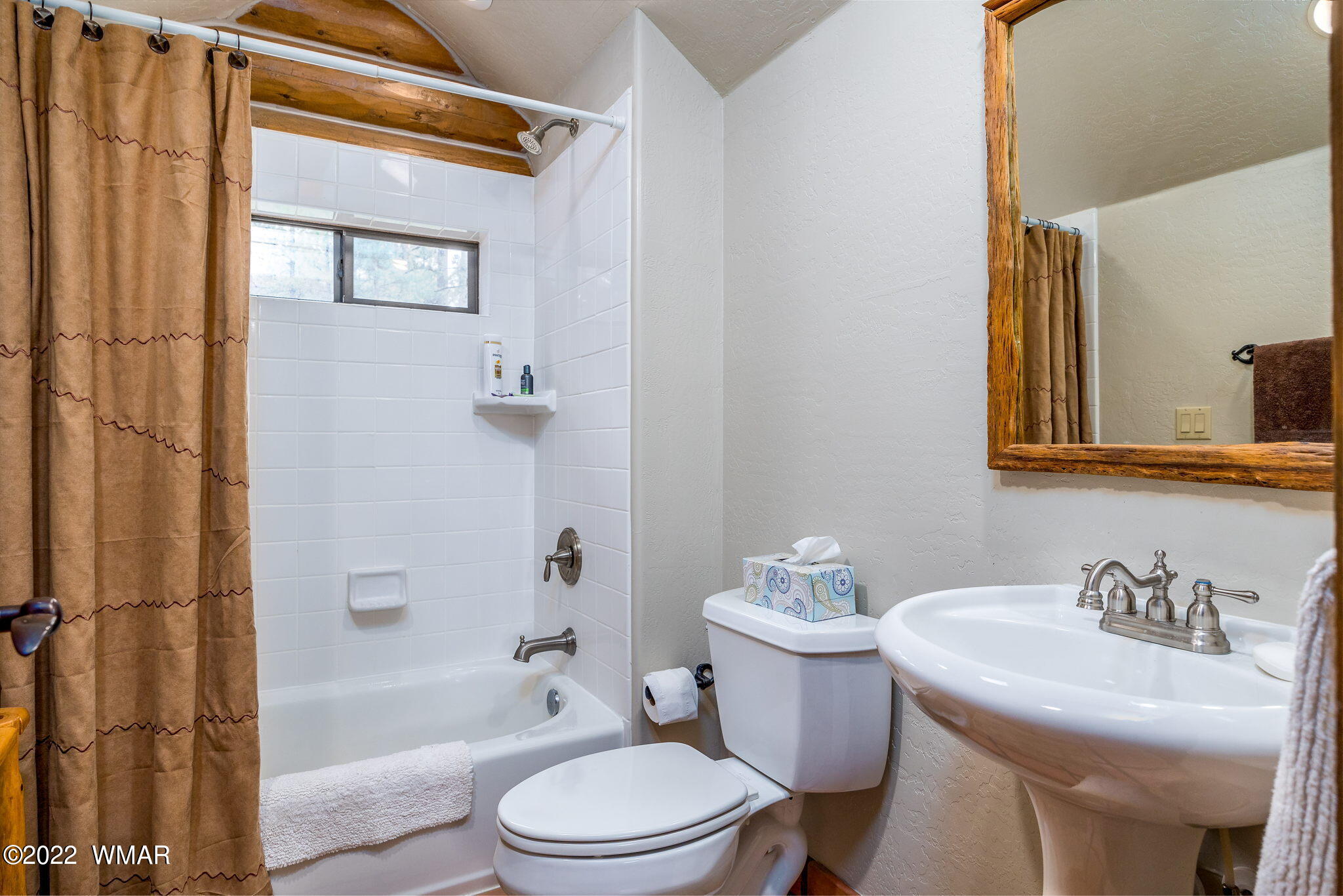 11 N1063 Greer, AZ 85927 - Photo 27 of 31 a bathroom with a sink toilet and shower
