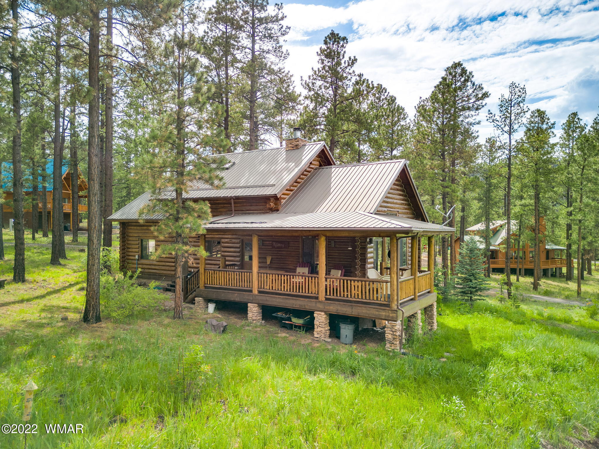 11 N1063 Greer, AZ 85927 - Photo 3 of 31 a view of a house with a backyard and a patio