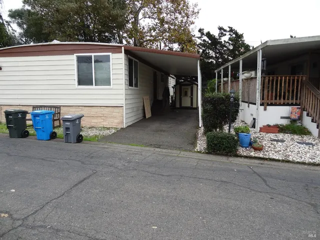 a view of a house with a street
