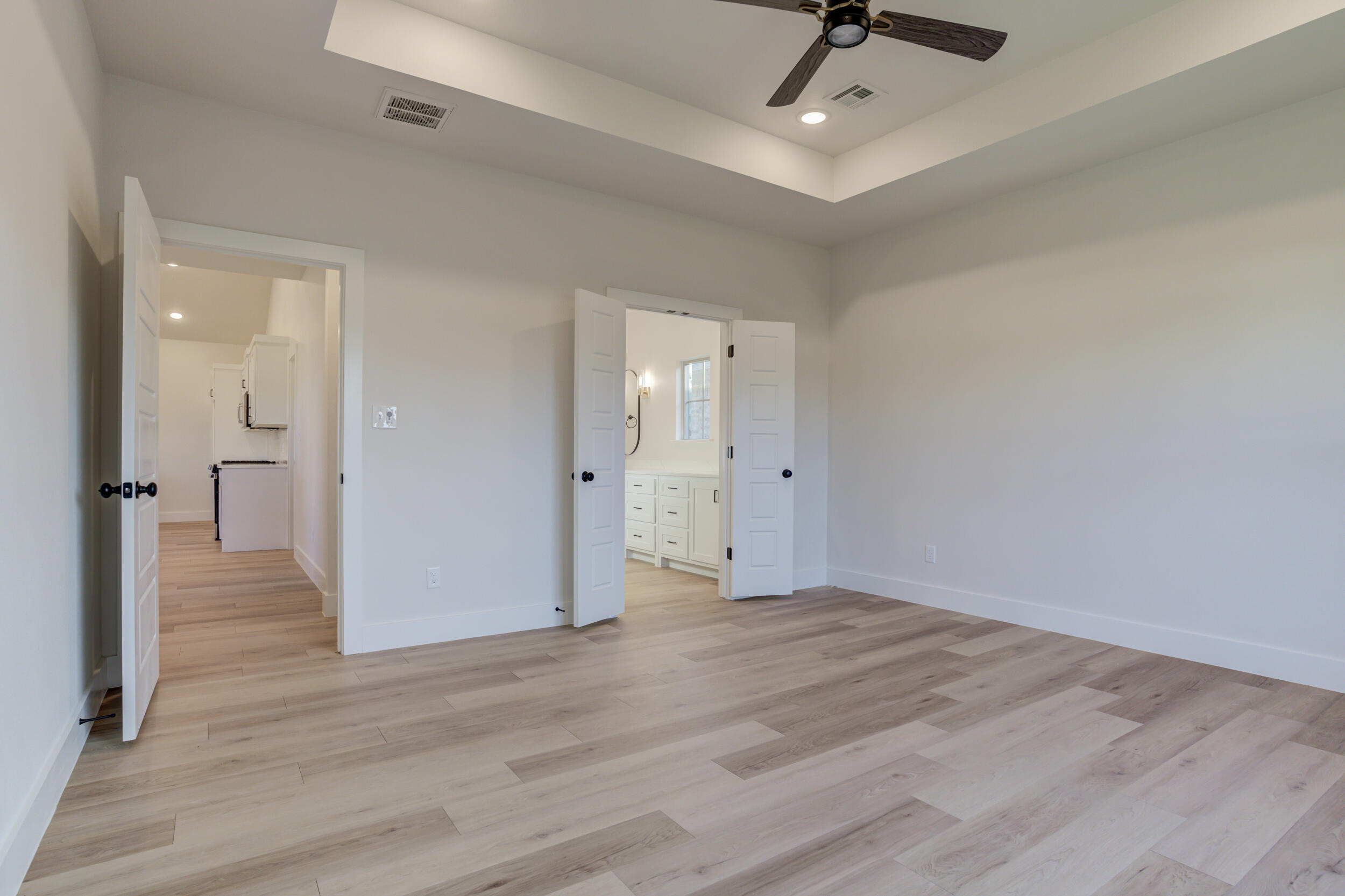 6913 13th Street Lubbock, TX 79416 - Photo 27 of 45 wooden floor in an empty room