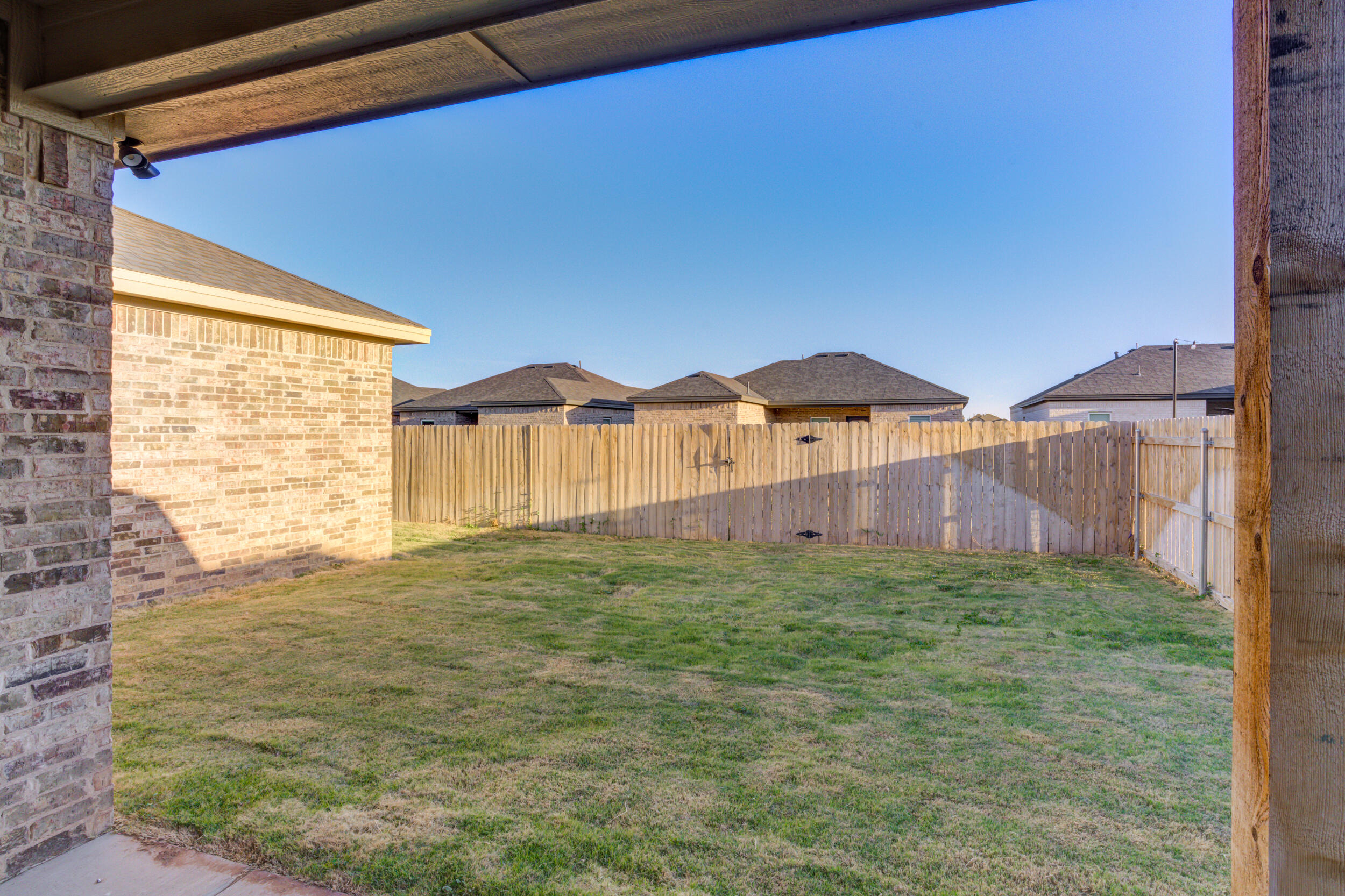 6913 13th Street Lubbock, TX 79416 - Photo 44 of 45 a view of an house with backyard and garden