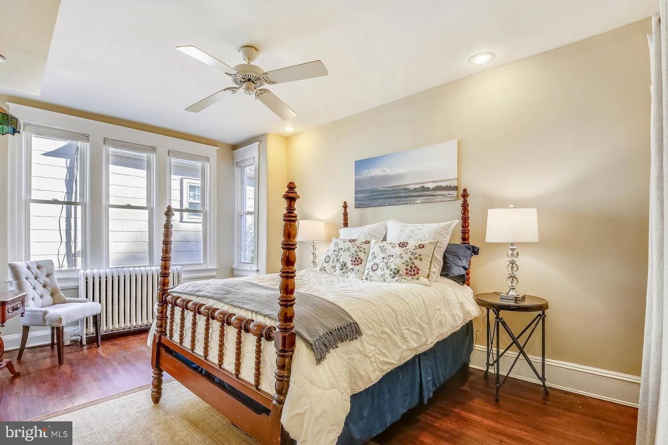 746 Thayer Avenue Silver Spring, MD 20910 - Photo 16 of 43 a bedroom with a bed and a table