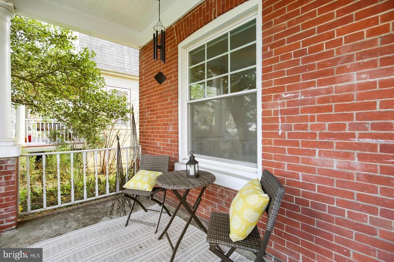 746 Thayer Avenue Silver Spring, MD 20910 - Photo 20 of 43 a balcony with table and chairs