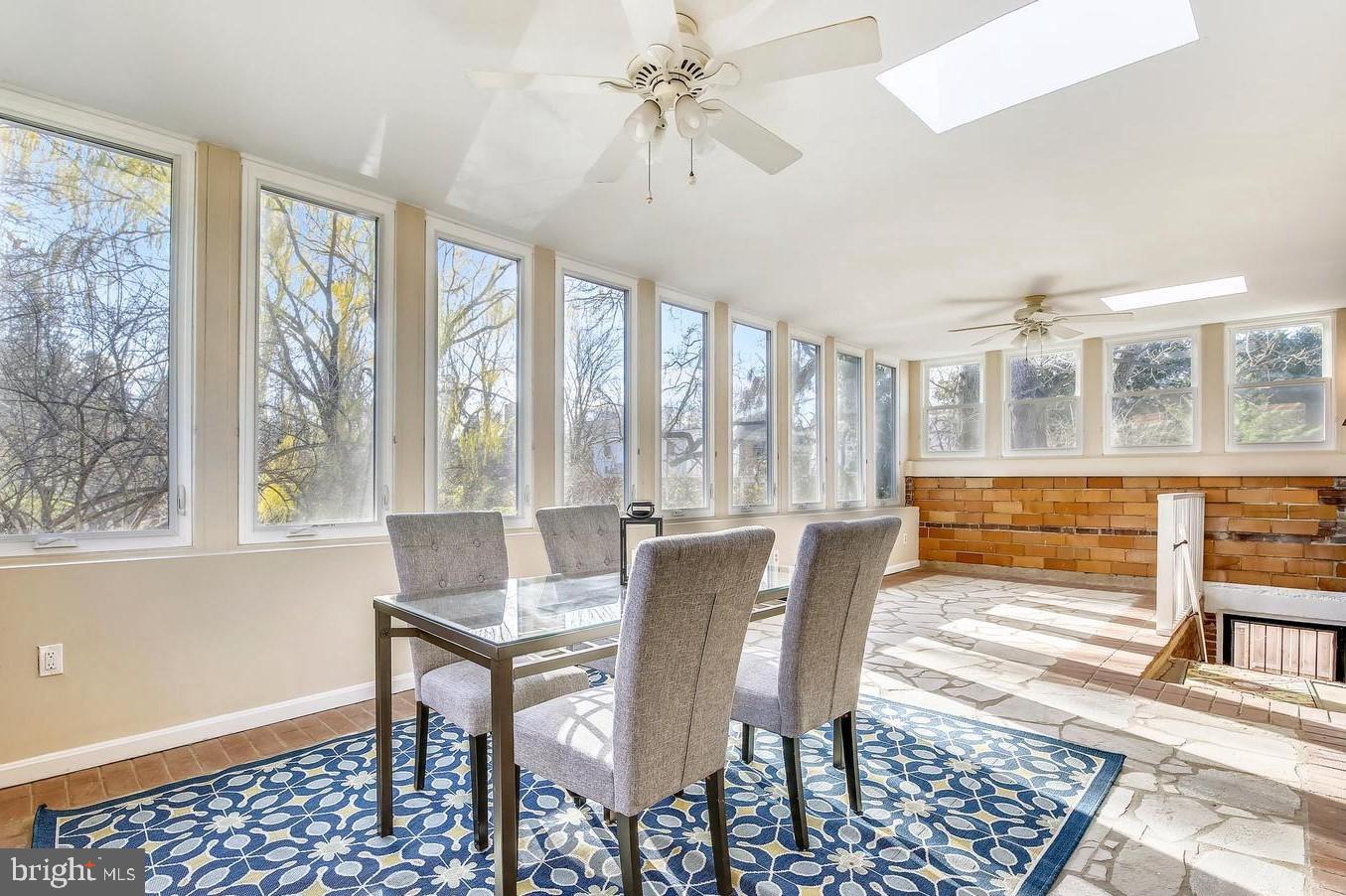 746 Thayer Avenue Silver Spring, MD 20910 - Photo 22 of 43 a view of a dining room with furniture window and wooden floor