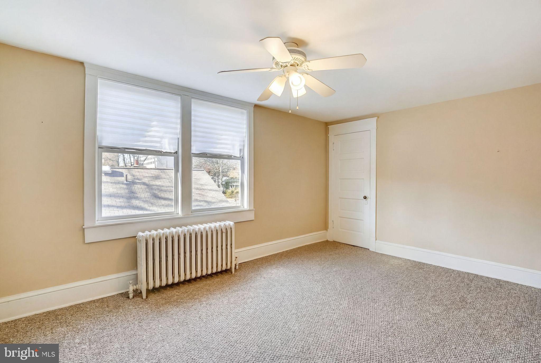 746 Thayer Avenue Silver Spring, MD 20910 - Photo 23 of 43 a view of an empty room with a window