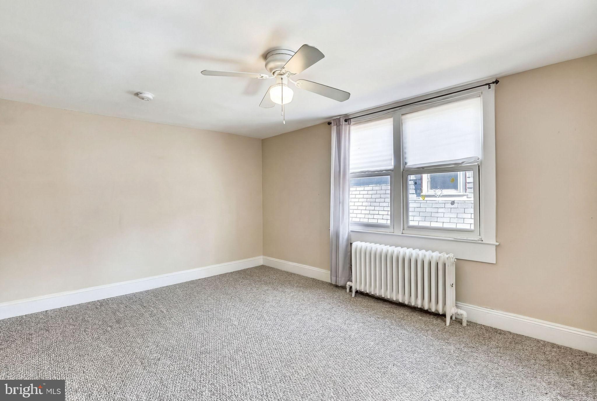 746 Thayer Avenue Silver Spring, MD 20910 - Photo 26 of 43 a view of an empty room with a window