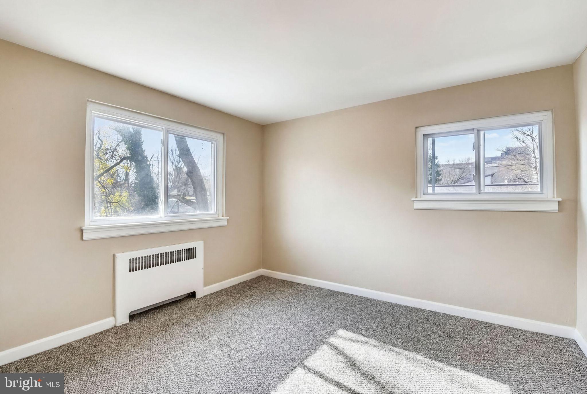 746 Thayer Avenue Silver Spring, MD 20910 - Photo 27 of 43 a view of an empty room with a window
