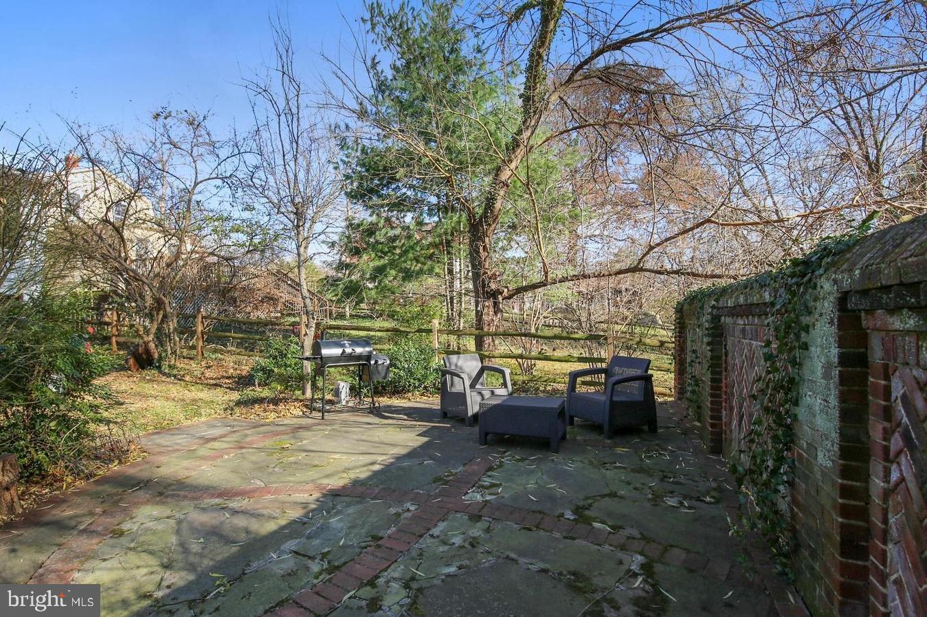 746 Thayer Avenue Silver Spring, MD 20910 - Photo 37 of 43 a view of backyard with table and chairs and couches