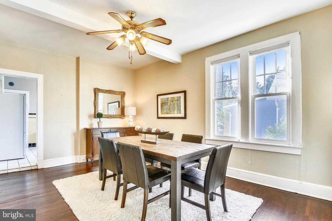 746 Thayer Avenue Silver Spring, MD 20910 - Photo 8 of 43 a view of a dining room with furniture and wooden floor