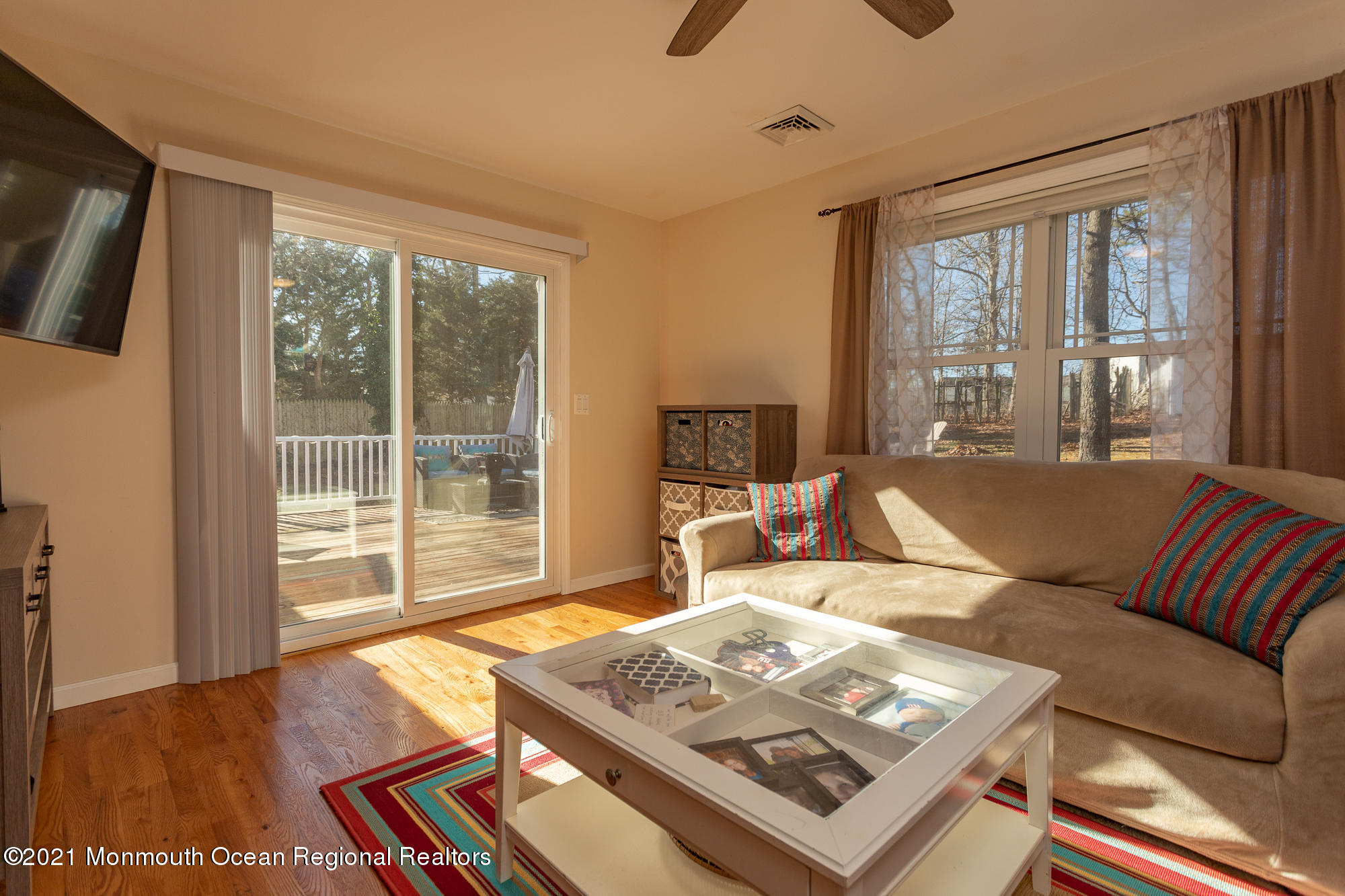 116 Toggle Road Manahawkin, NJ 08050 - Photo 15 of 26 a living room with furniture and a large window