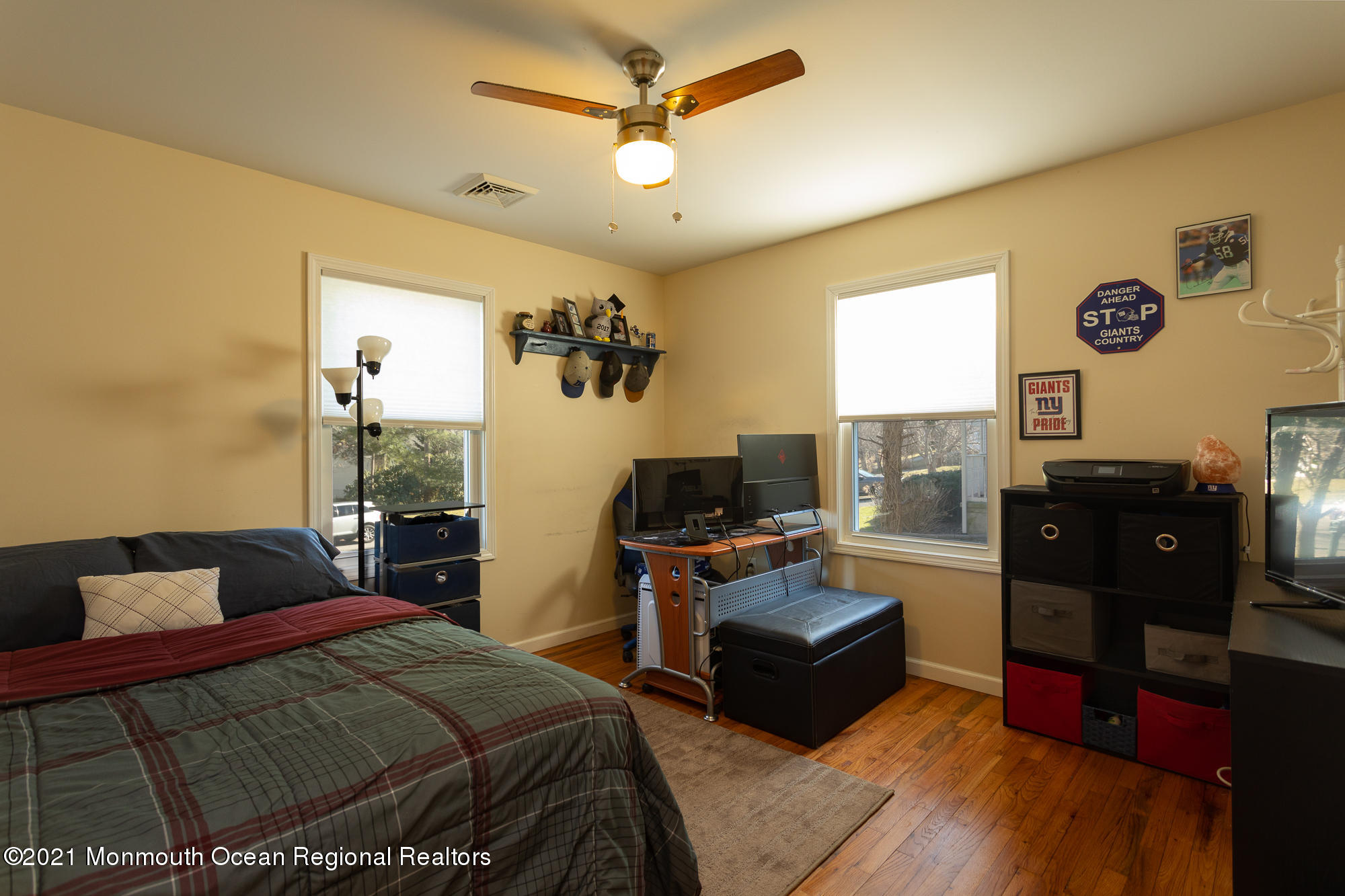 116 Toggle Road Manahawkin, NJ 08050 - Photo 18 of 26 a bedroom with a bed and wooden floor