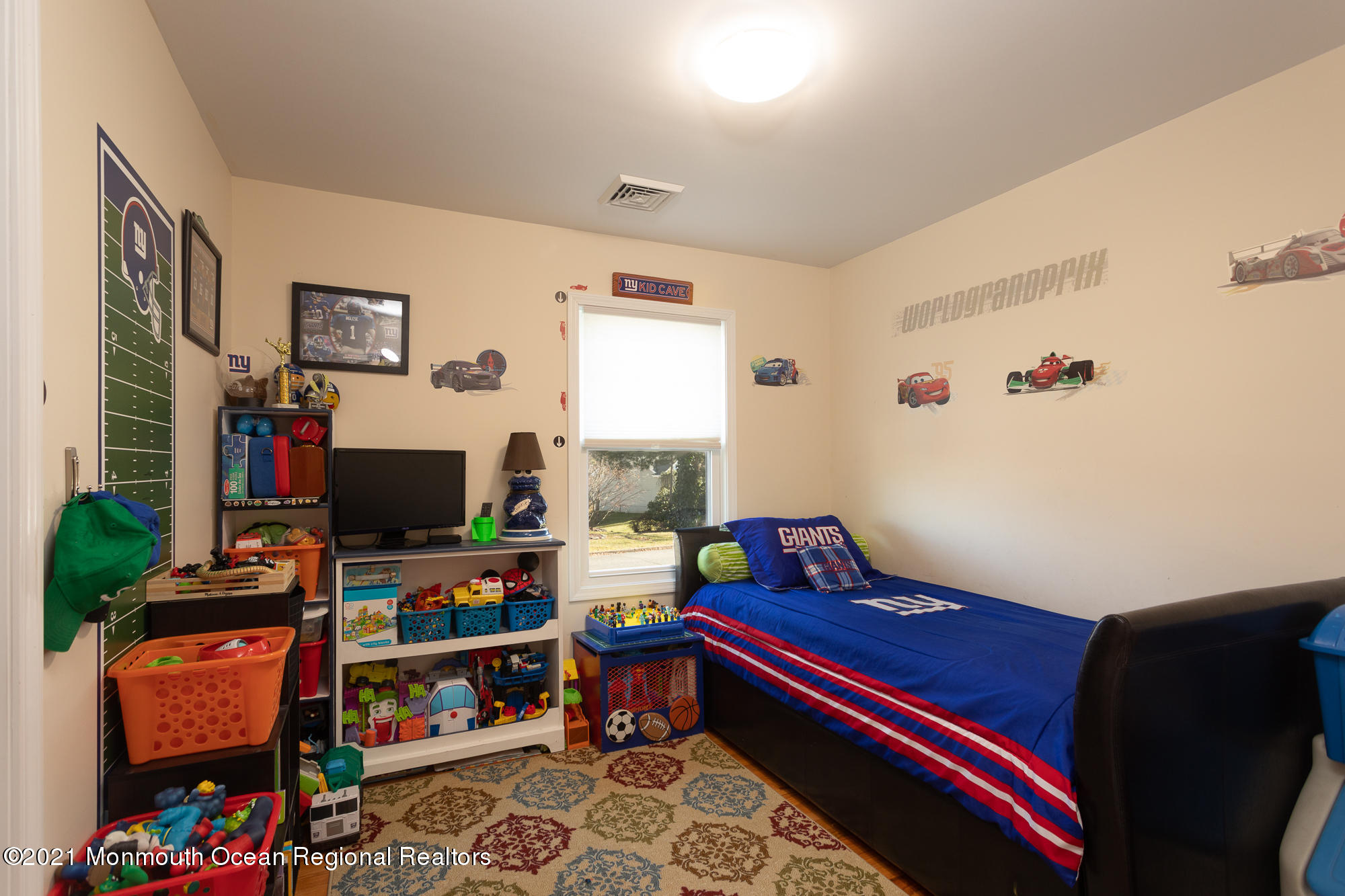 116 Toggle Road Manahawkin, NJ 08050 - Photo 19 of 26 a room with furniture and a flat screen tv