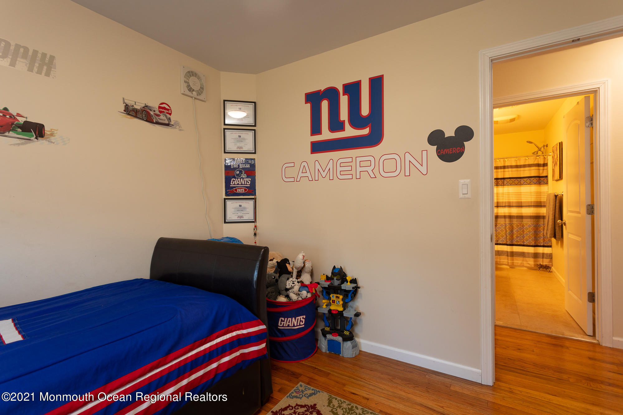 116 Toggle Road Manahawkin, NJ 08050 - Photo 20 of 26 a room with wooden floor and furniture