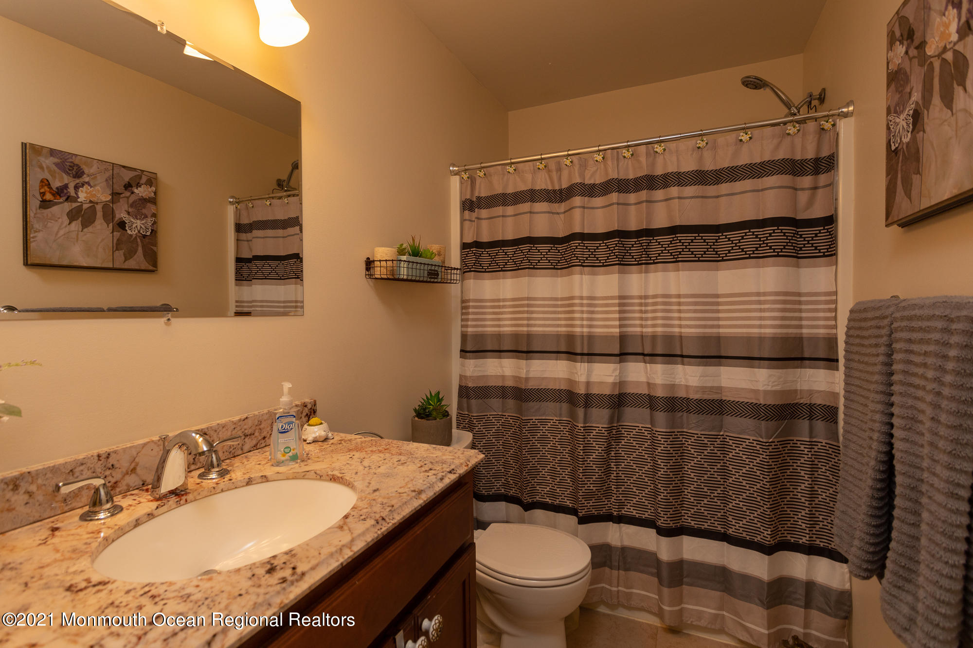116 Toggle Road Manahawkin, NJ 08050 - Photo 21 of 26 a bathroom with a granite countertop sink toilet and shower