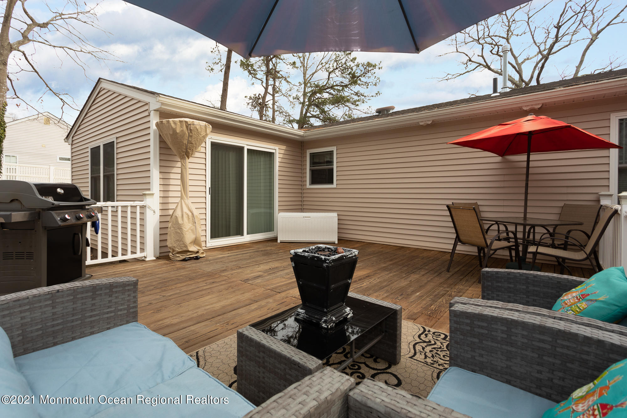 116 Toggle Road Manahawkin, NJ 08050 - Photo 22 of 26 a view of a couches in the patio