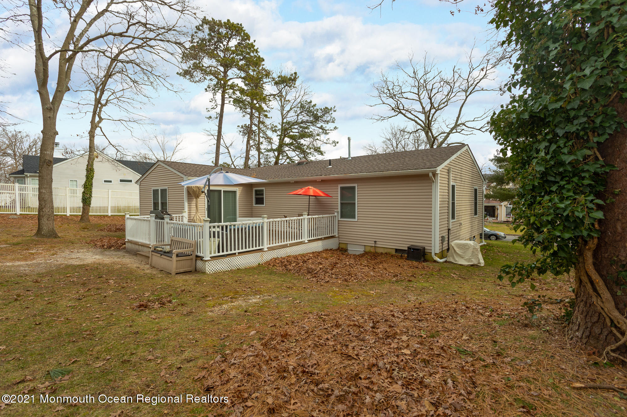 116 Toggle Road Manahawkin, NJ 08050 - Photo 23 of 26 a view of a house with a yard