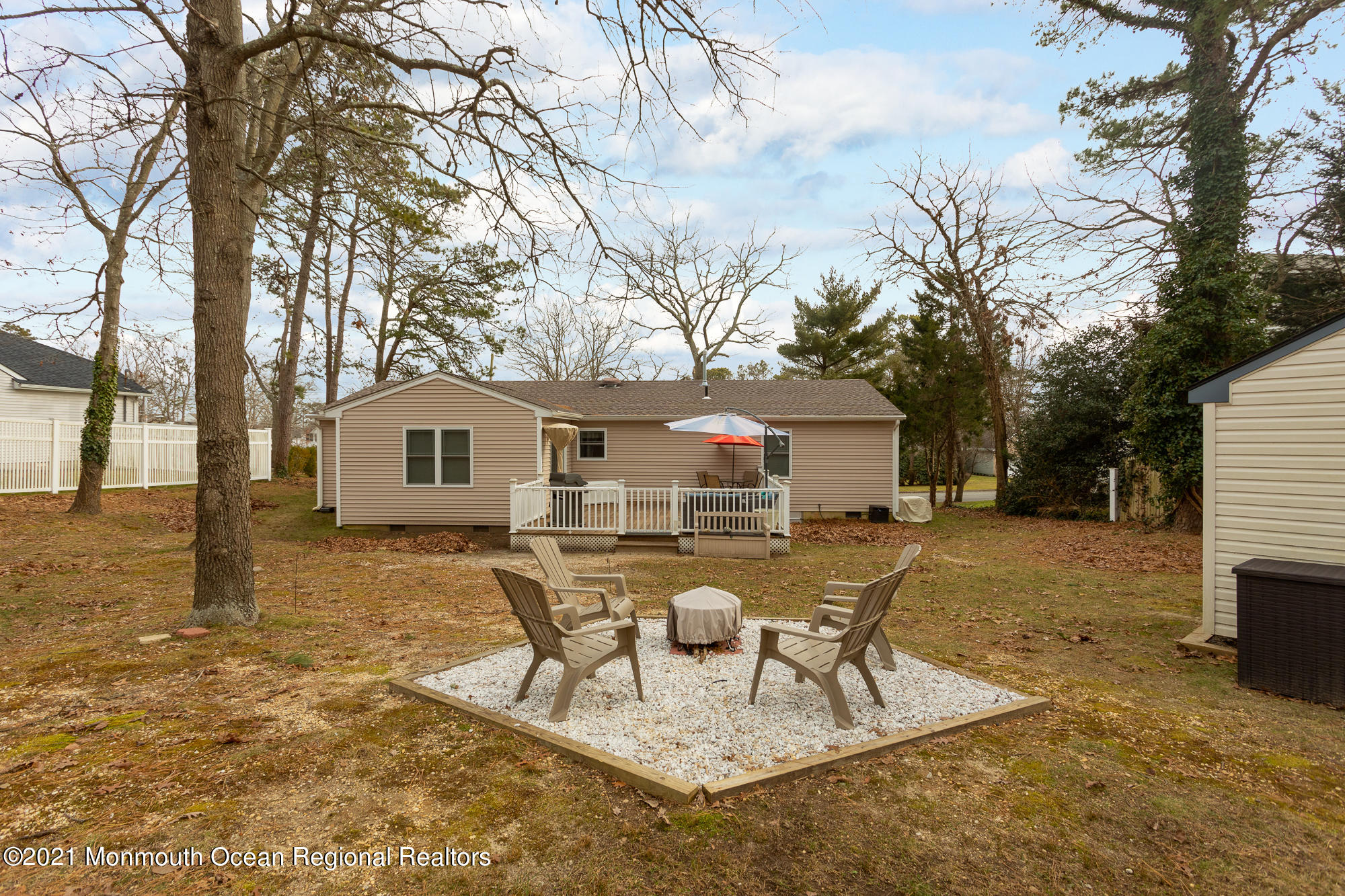 116 Toggle Road Manahawkin, NJ 08050 - Photo 24 of 26 a view of a house with yard and sitting area