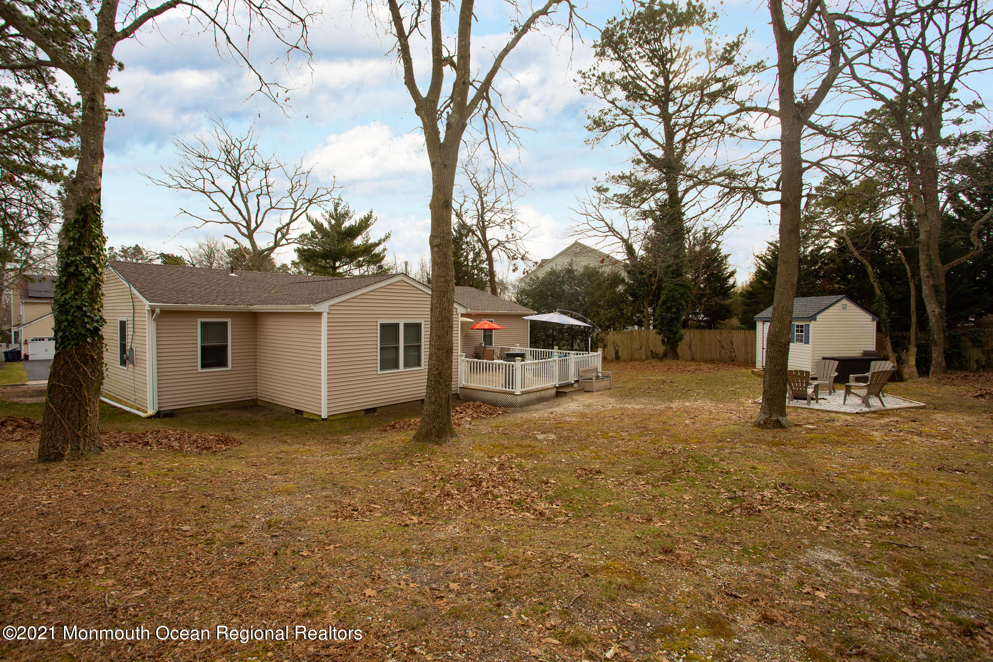 116 Toggle Road Manahawkin, NJ 08050 - Photo 25 of 26 a view of a house with a yard