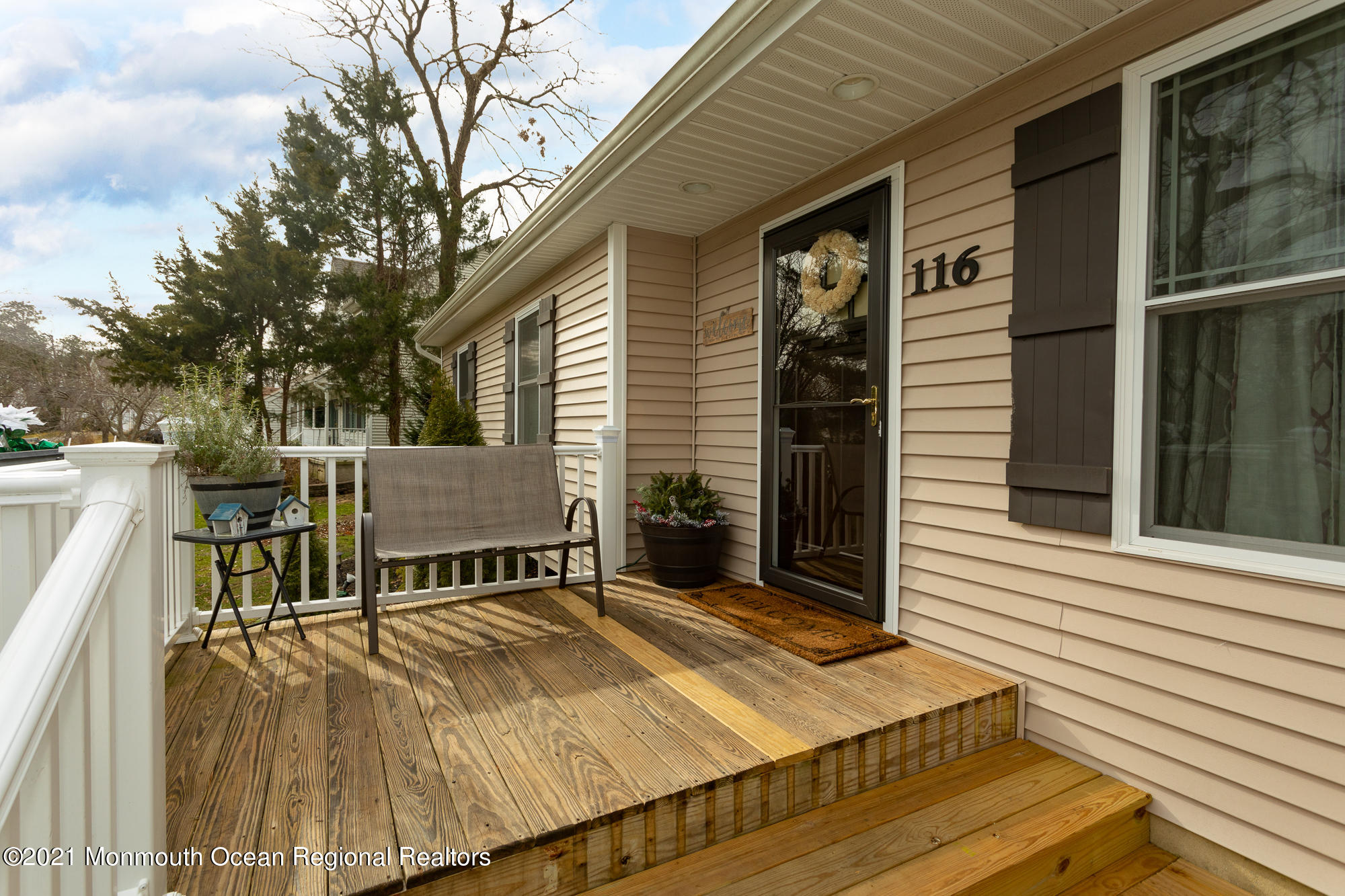 116 Toggle Road Manahawkin, NJ 08050 - Photo 6 of 26 a view of a backyard with sitting area