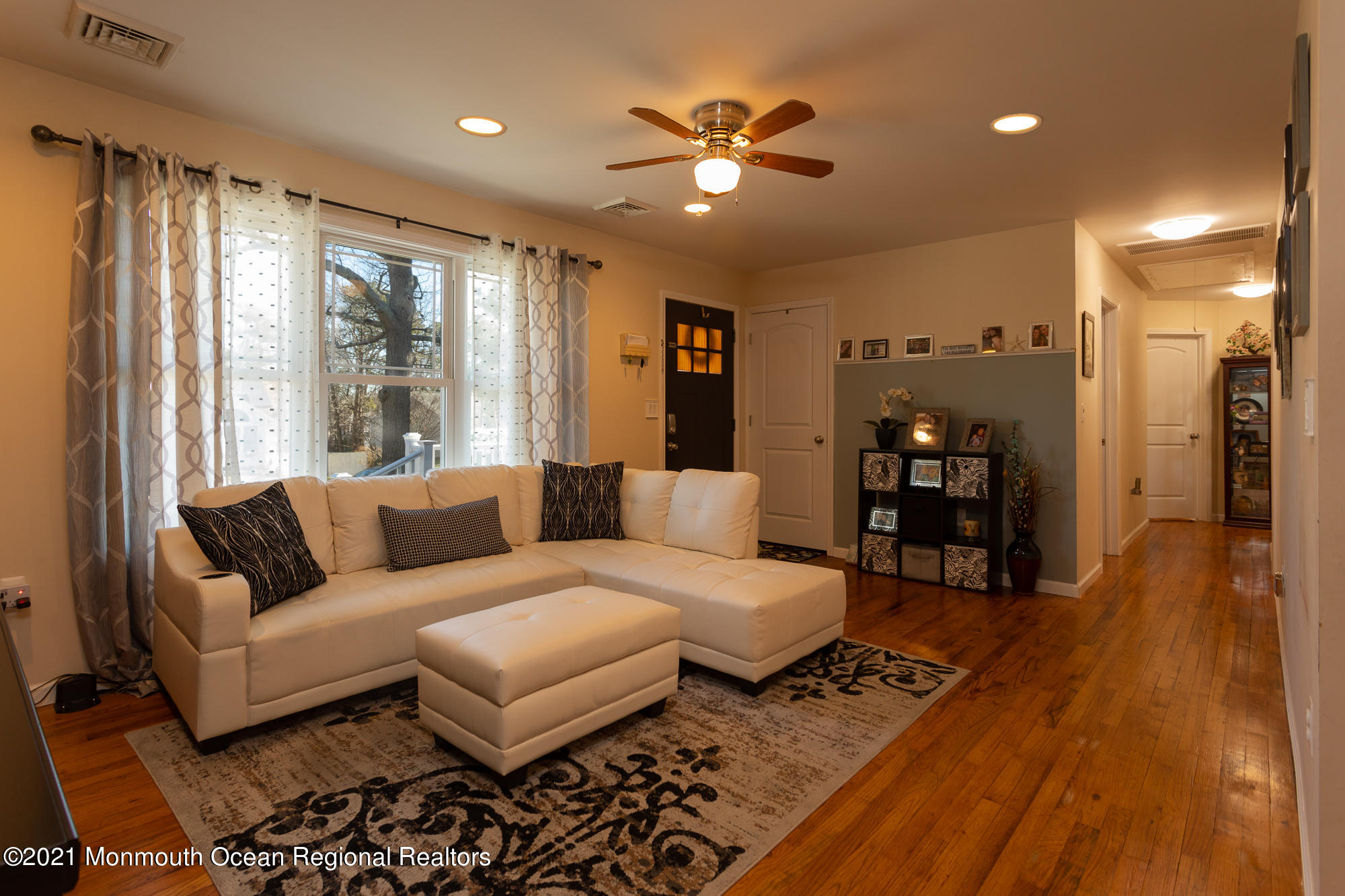 116 Toggle Road Manahawkin, NJ 08050 - Photo 7 of 26 a living room with furniture and a large window