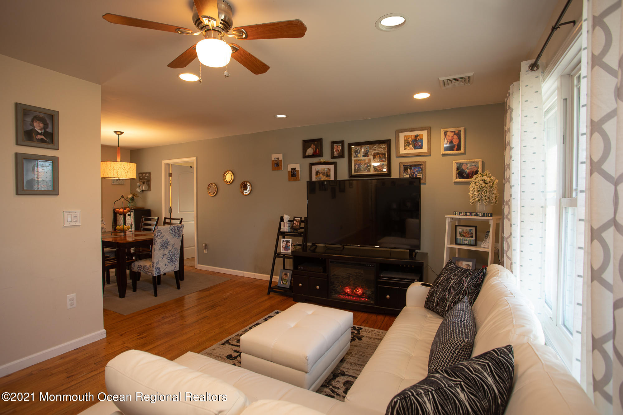 116 Toggle Road Manahawkin, NJ 08050 - Photo 9 of 26 a living room with furniture and a flat screen tv