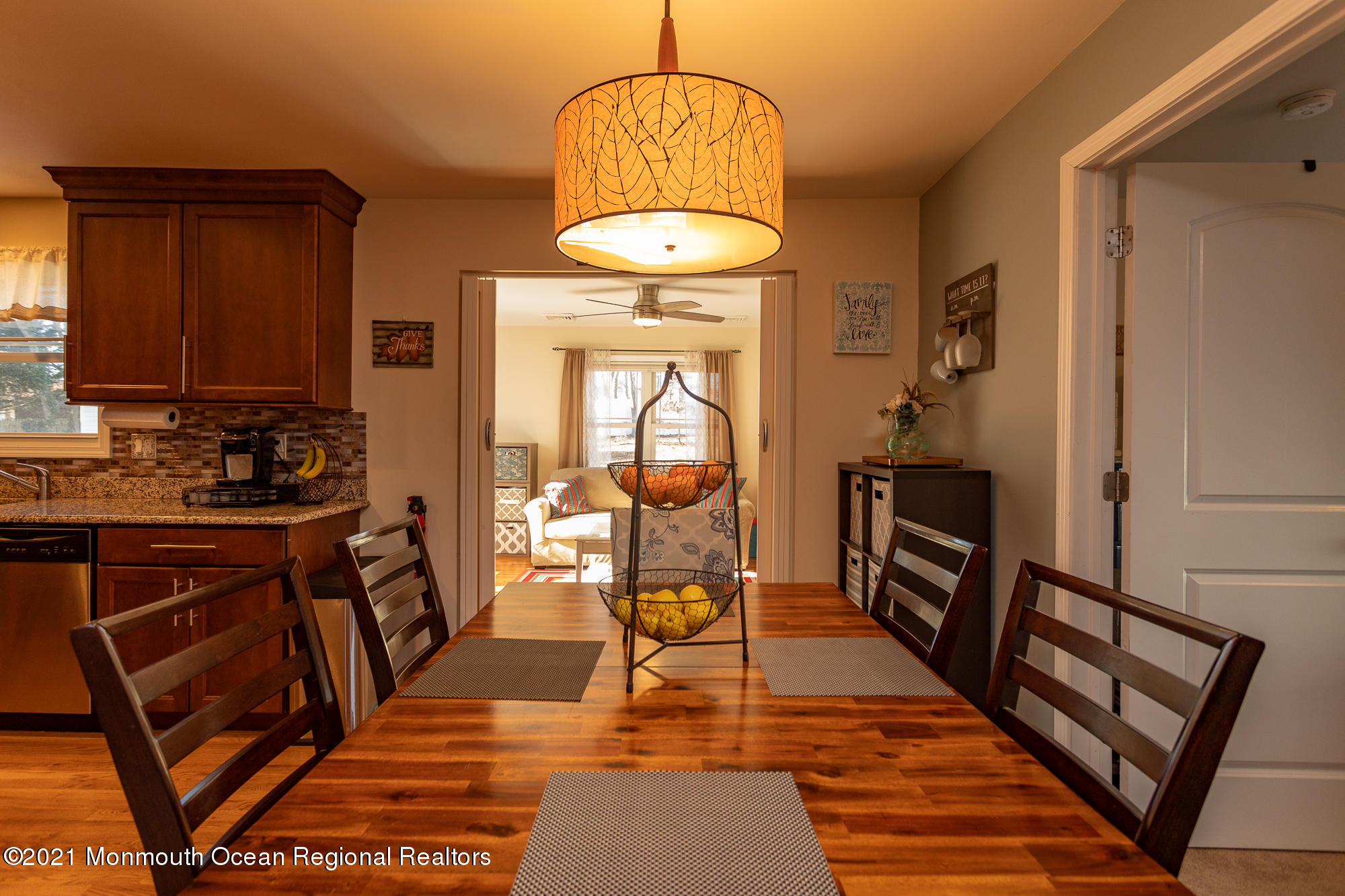 116 Toggle Road Manahawkin, NJ 08050 - Photo 10 of 26 a view of a livingroom with furniture wooden floor and a chandelier