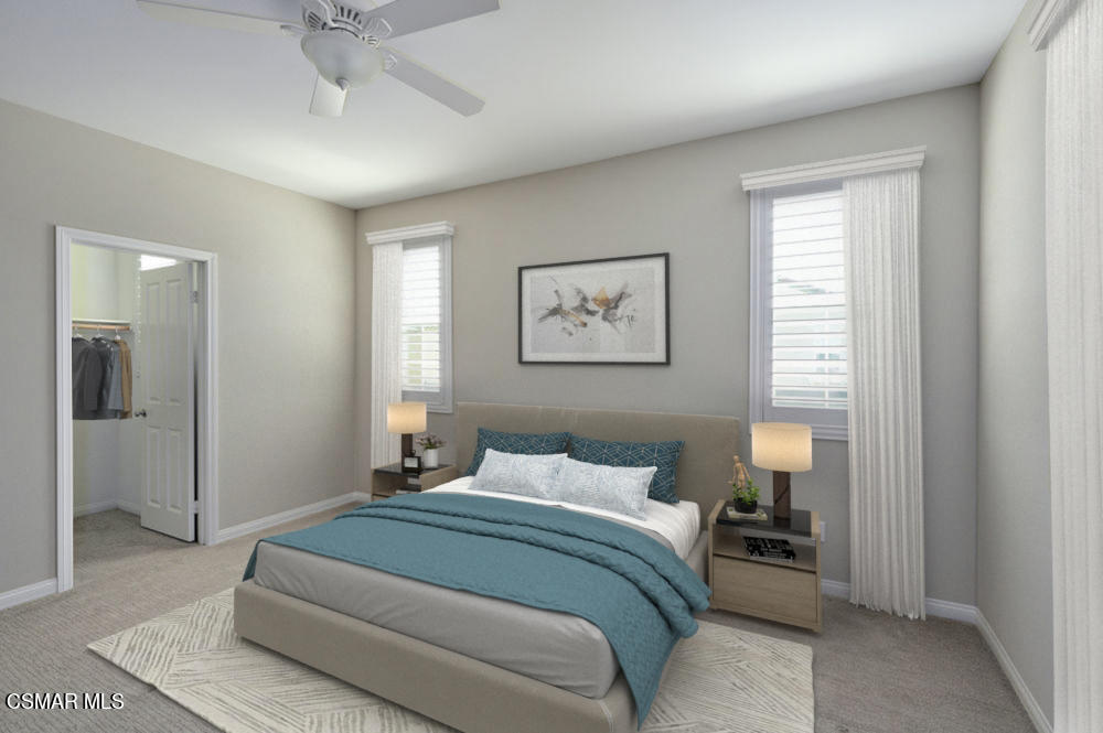 186 Stonegate Road Camarillo, CA 93010 - Photo 22 of 34 a bedroom with a large bed and a chandelier