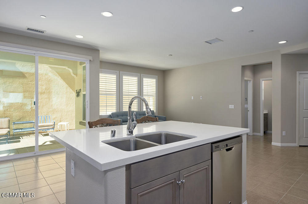 186 Stonegate Road Camarillo, CA 93010 - Photo 9 of 34 a kitchen with a sink and large window